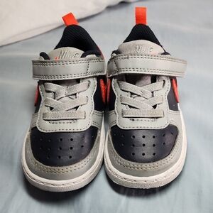 Nike Orange and Gray Sneakers with Sporty Mesh Design and Velcroe